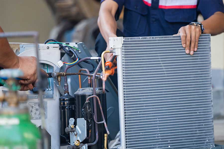 Technician performing ac repair